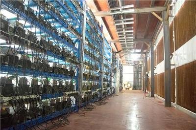 A mining farm with many mining machines is running