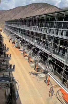 UK-based mining farm showcasing rows of ASIC miners operating efficiently
